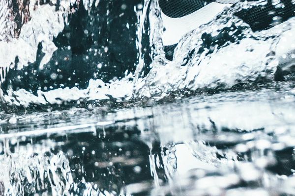 A person in mid-motion during a fluid exercise.