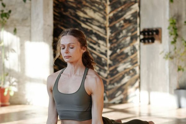 Sunlight streaming into a room prepared for an exercise session.